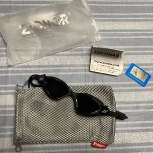 NWT Zionor black swim goggles.